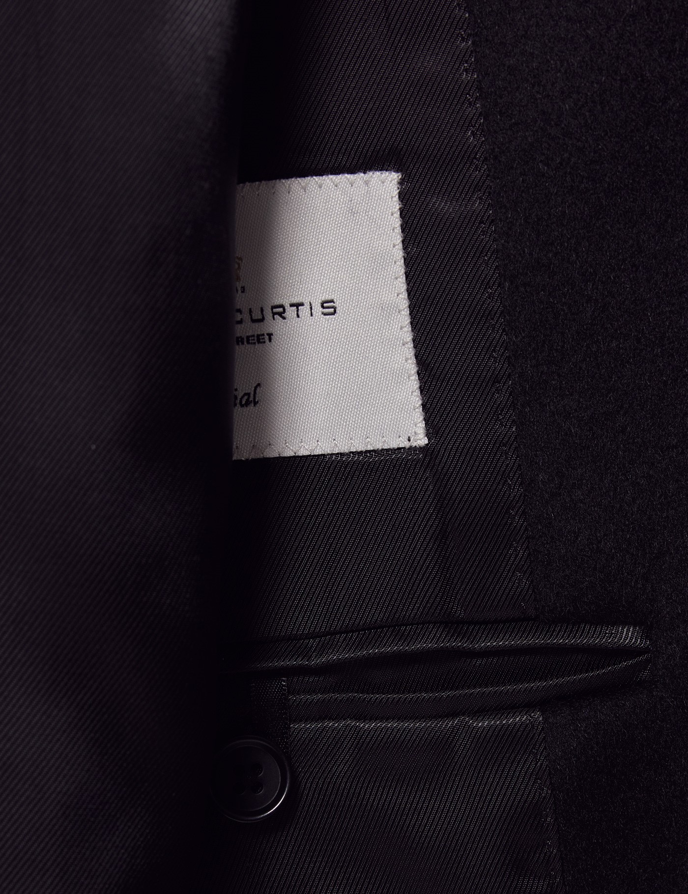 Men’s Black Wool Overcoat with Back Vent | Hawes & Curtis