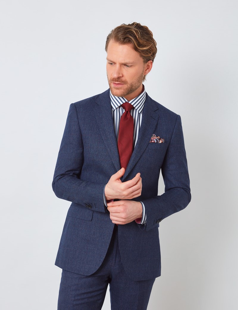 navy blue 3 piece suit with red tie