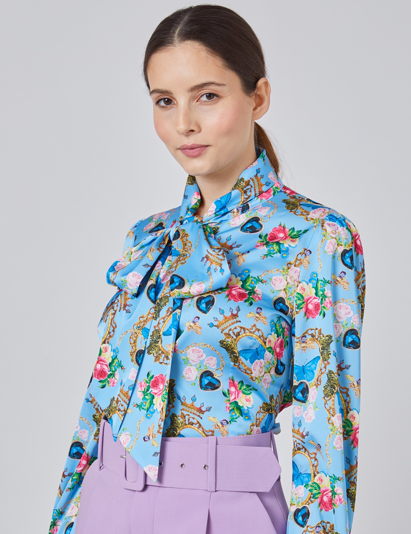 Image of Hawes & Curtis Women's & Yellow Floral Fitted Satin Blouse in Light Blue/Yellow Size  Single Cuff Pussy Bow