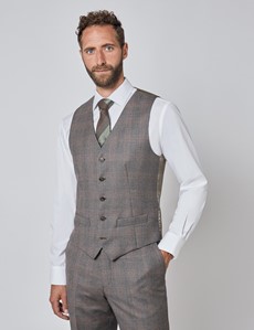 brown vest and pants